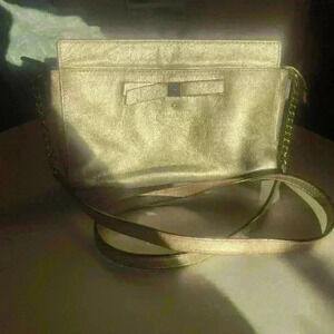 Kate Spade New York Beacon Court Angelica Patent Leather Crossbody in Gold